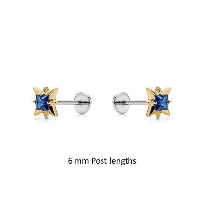 Titanium gold gem earring on a post 6 mm with a  white background