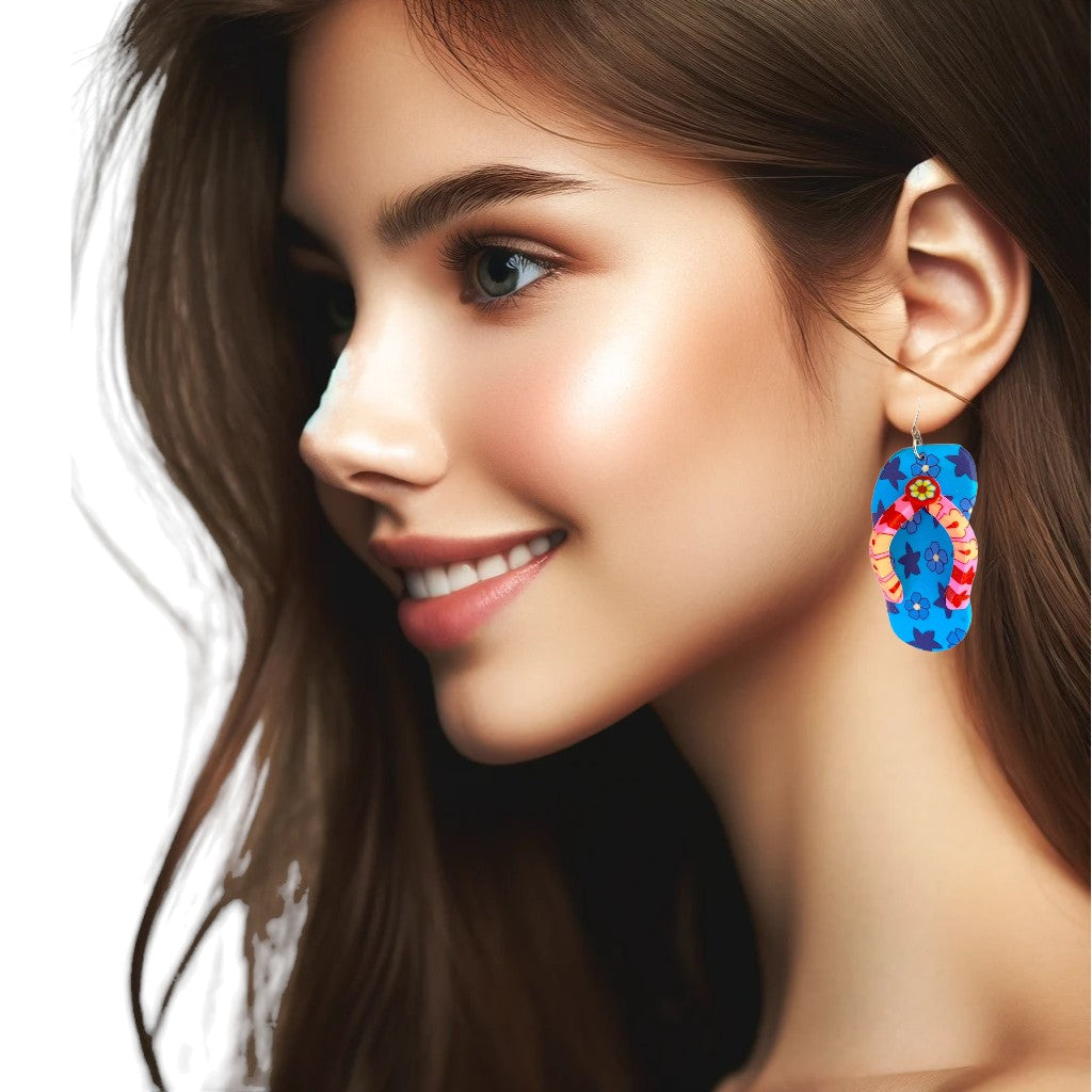 Flip flop earrings in blue with a titanium hook on a white young woman.