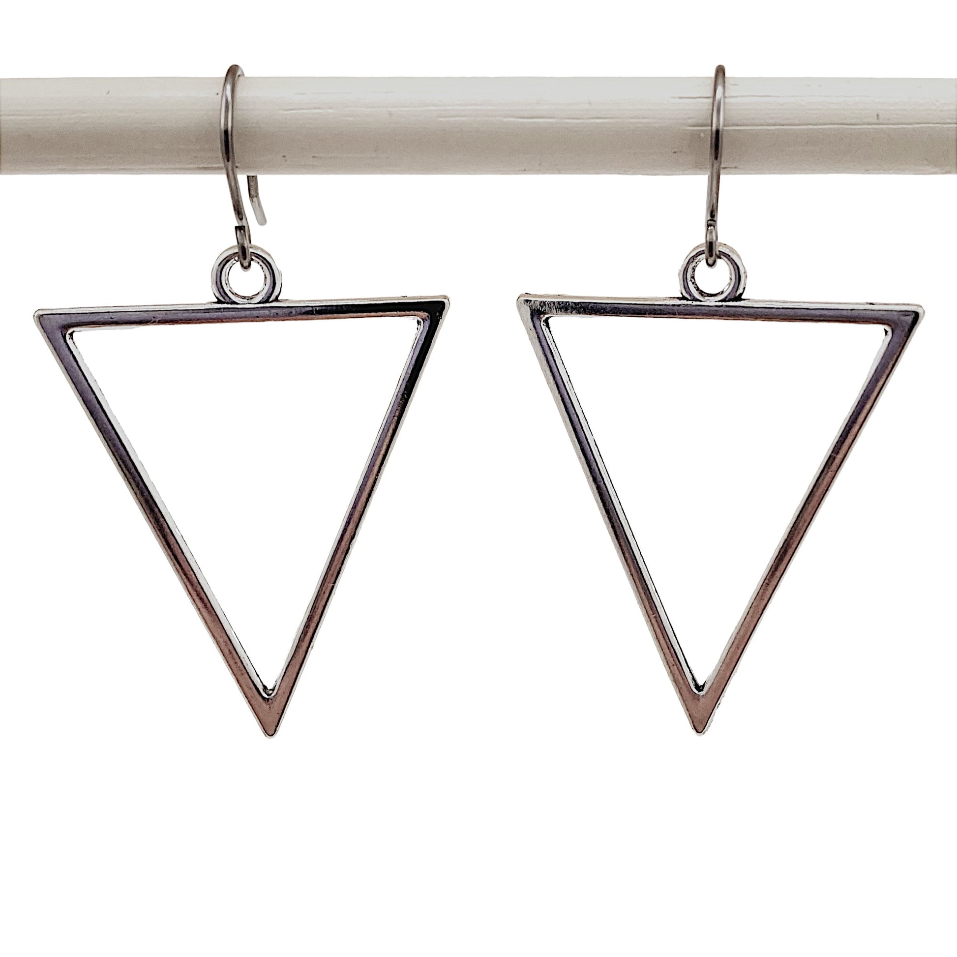 Geometric Silver Triangle earrings and a titanium hook on a white background