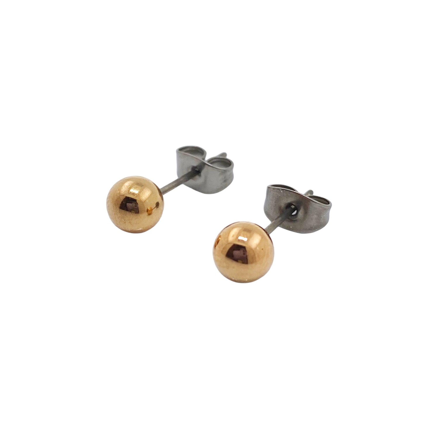 Gold Titanium Ball Studs. Titanium Studs with titanium backs. These minimal studs 6mm shown on a white background