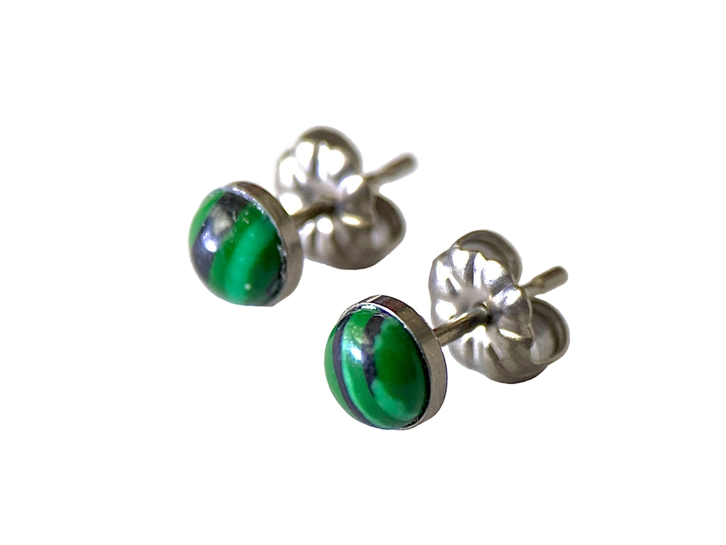 Marbled Studs -solid titanium studs and backs- Feature a small and minimal design on a white background. green