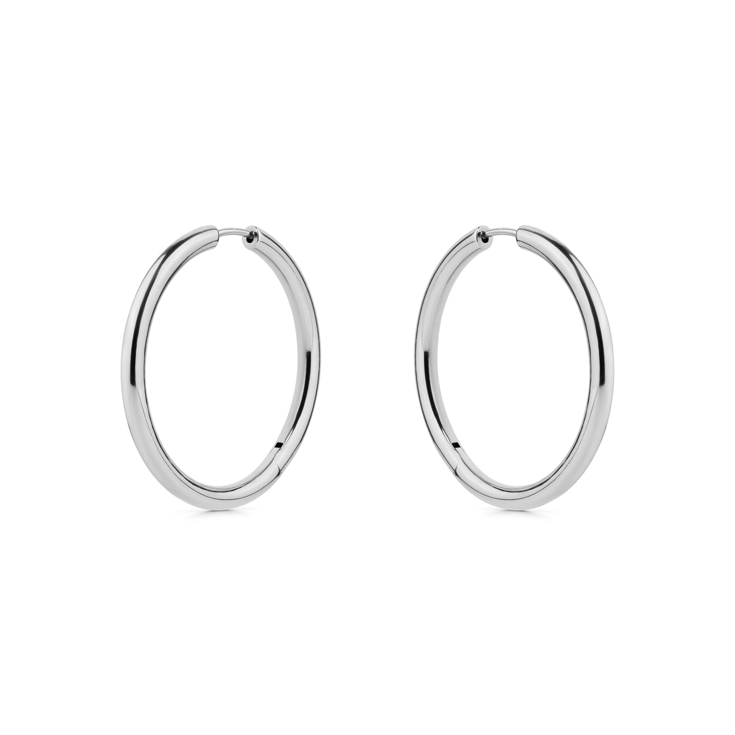 Pair of silver titanium hoop earrings on a white background