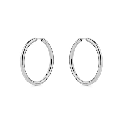 Pair of silver titanium hoop earrings on a white background