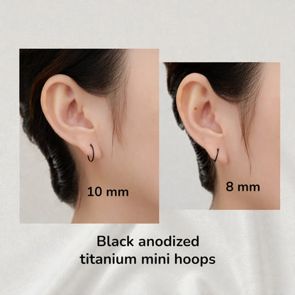 Black anodized titanium mini hoops earrings on a white background with text detailing diameter.