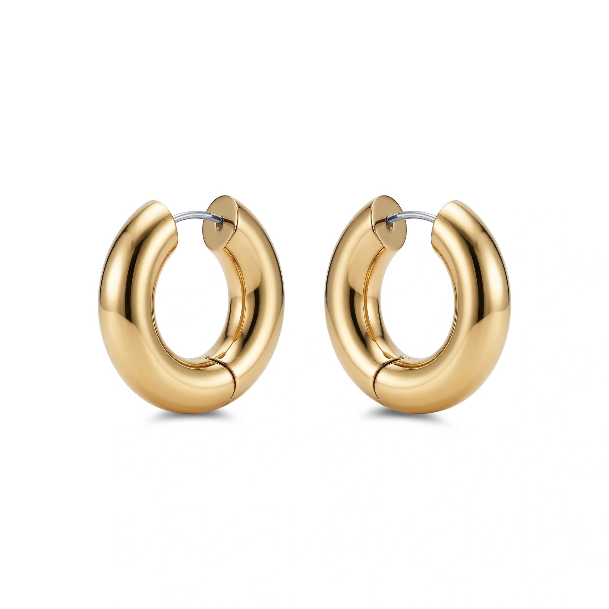Chunky Gold titanium hoop earrings on a white background