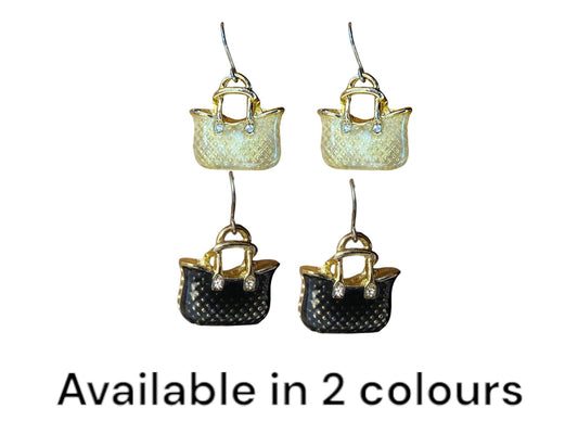 Handbag Charm earrings with a titanium hook on a white background. clear and black