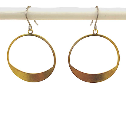 Hoop circles earring with a titanium hook on a white background