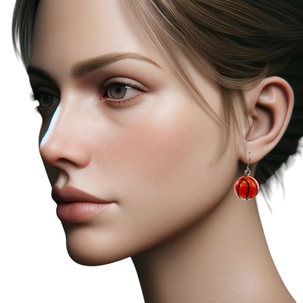 Basketball drop Hypoallergenic earrings with titanium hook on a white young woman.