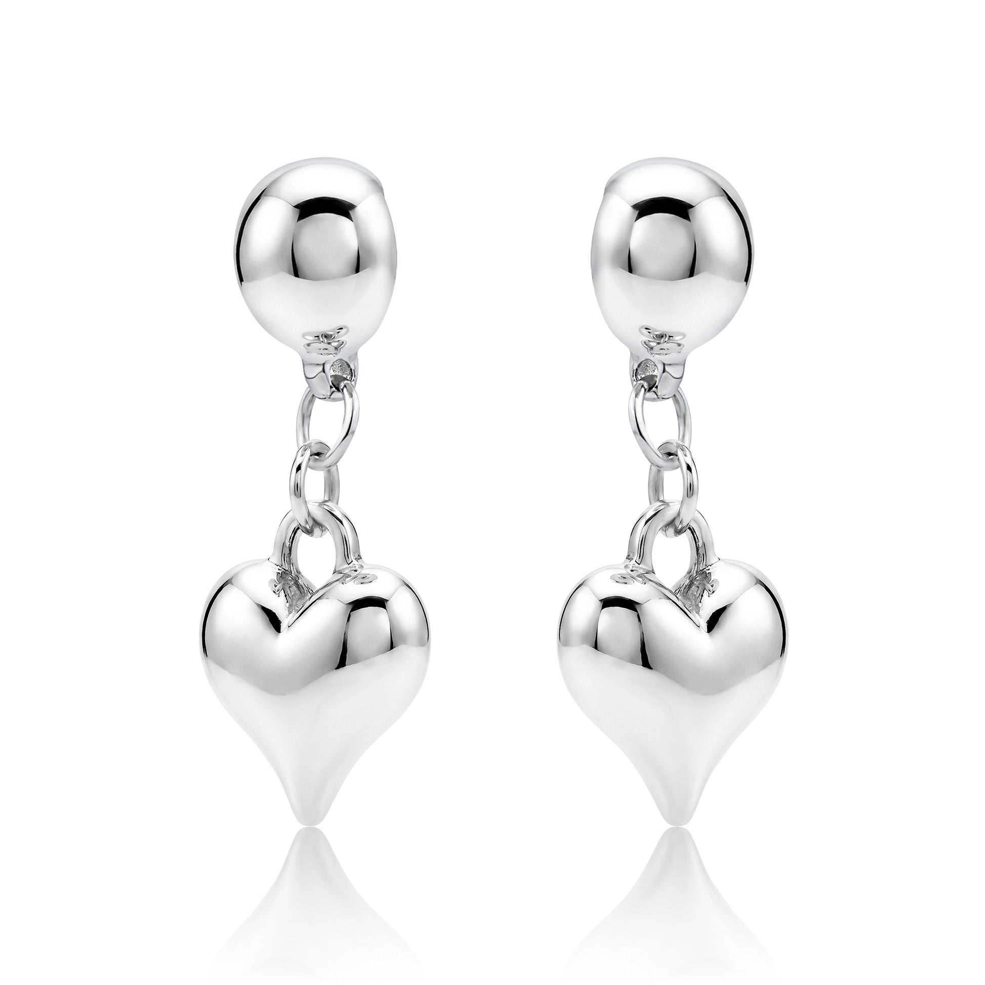 Magnetic silver heart earrings. Detachable earrings truly hypoallergenic on a white background