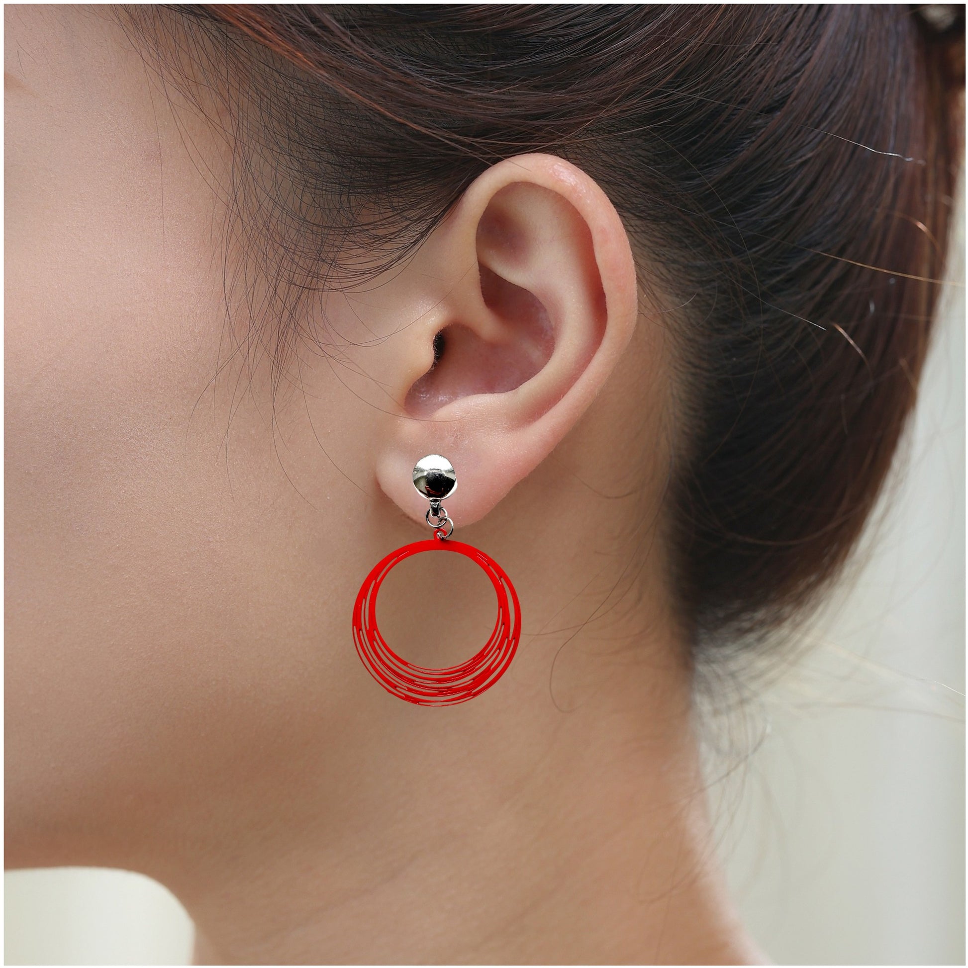 TI-GO Red String Rings Magnetic titanium interchangeable detachable earrings for a truly hypoallergenic earrings on a white young woman