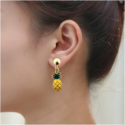 Pineapple Charm Earring. Detachable earrings truly hypoallergenic on a white young woman