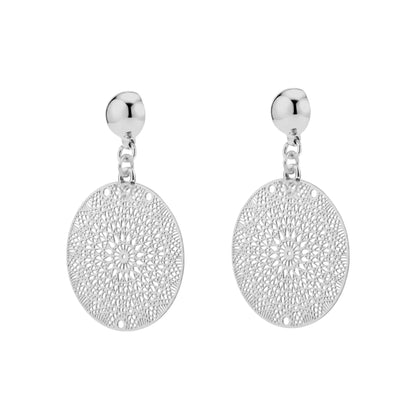 Titanium interchangeable magnetic silver disc earrings with intricate designs on a white background