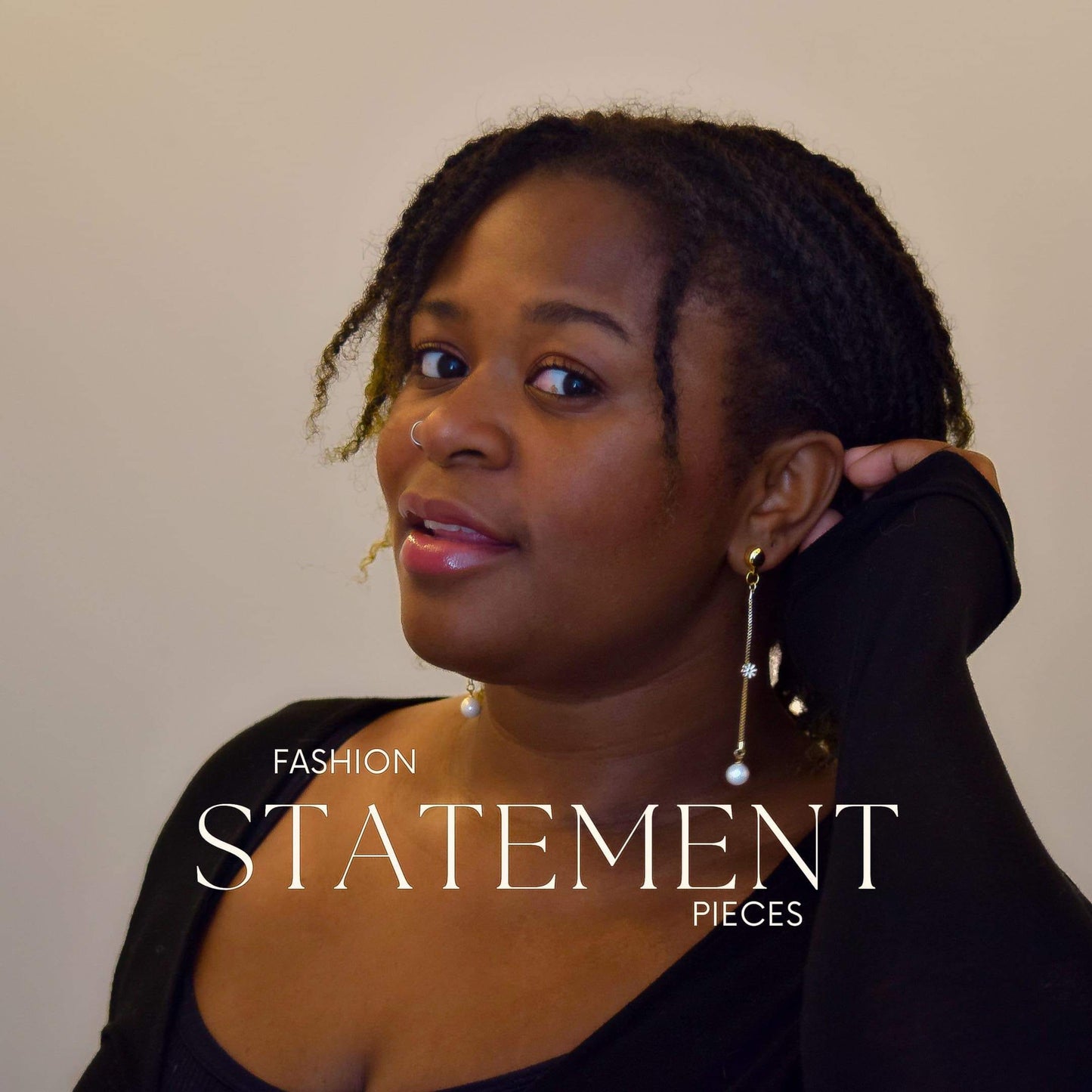 TI-GO Daisy and Pearl earrings. Magnetic titanium interchangeable earring system. Detachable earrings for a truly hypoallergenic jewellery on a black woman.