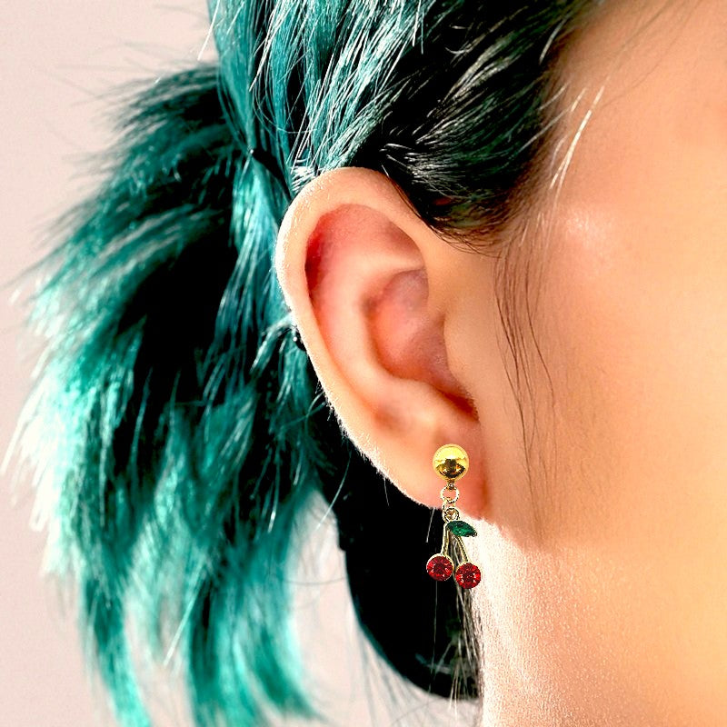  Cherry  gem interchangeable with a titanium magnetic stud on a white young woman