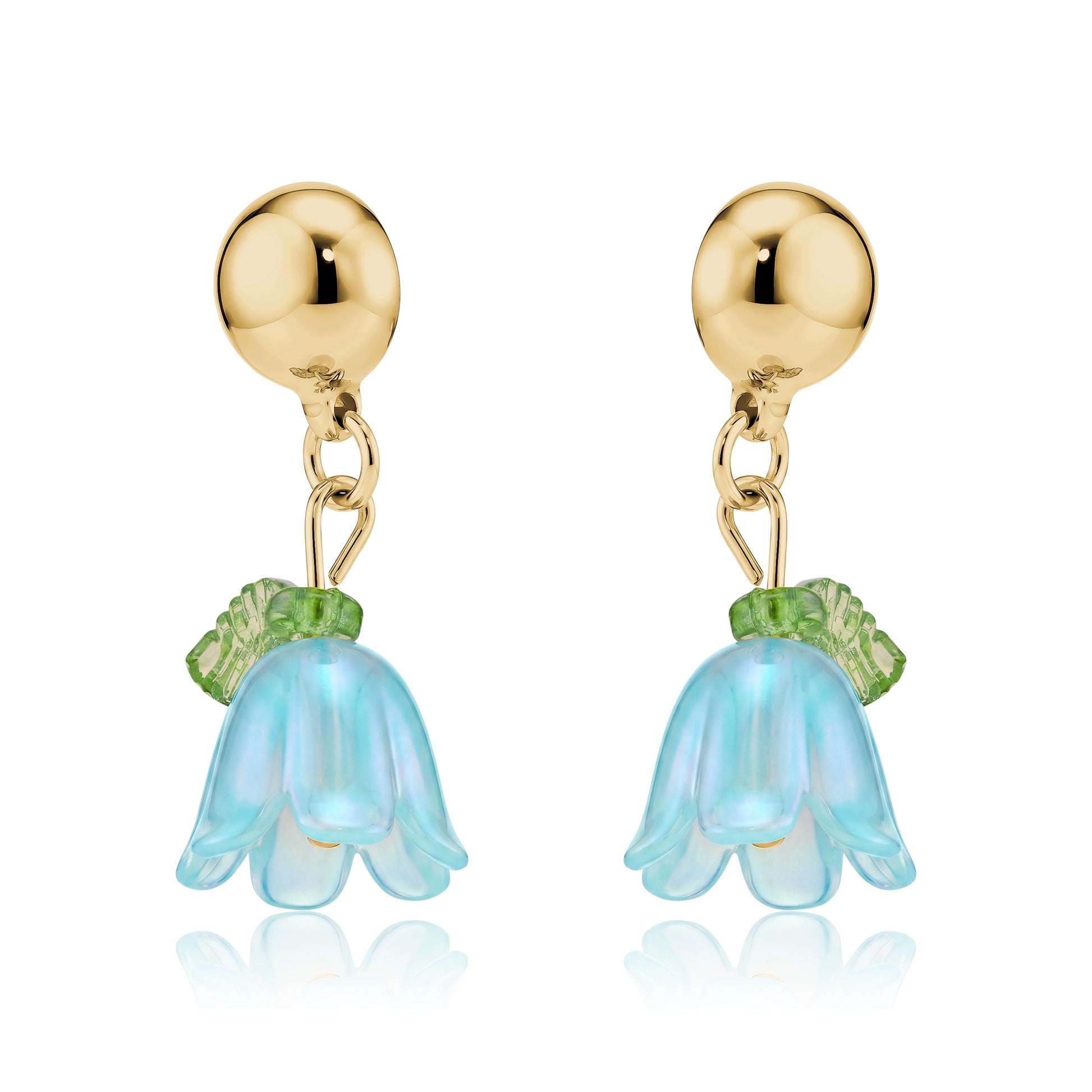 Interchangeable magnetic blue bell flower titanium earrings on a white background