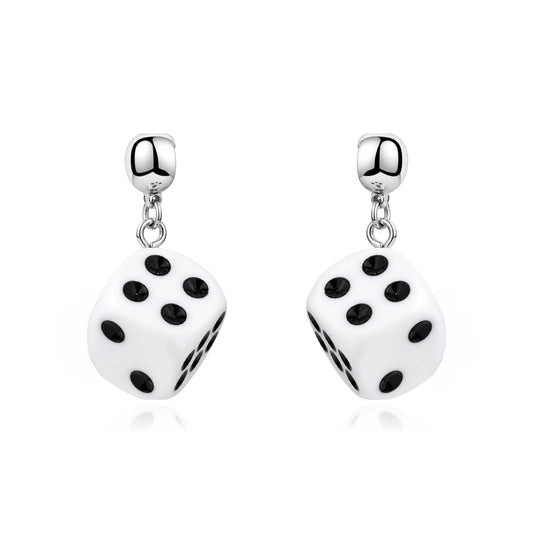 A pair of interchangeable magnetic silver dangling earrings featuring white dice charms with black printed dots, shown on a clean white background.