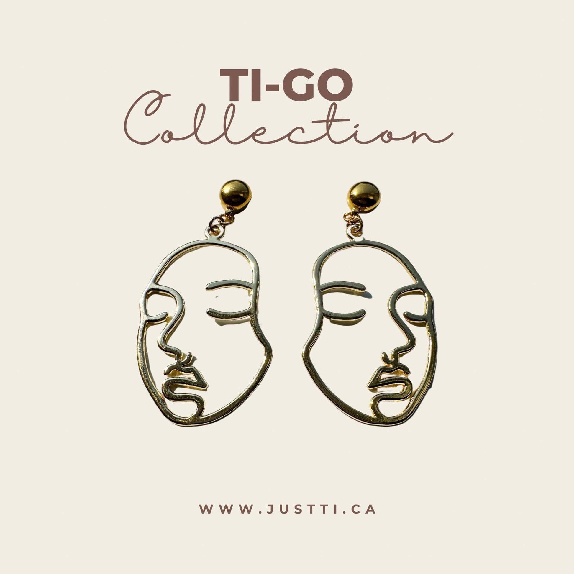 Golden face earrings. Detachable earrings for a truly hypoallergenic jewellery on a white background