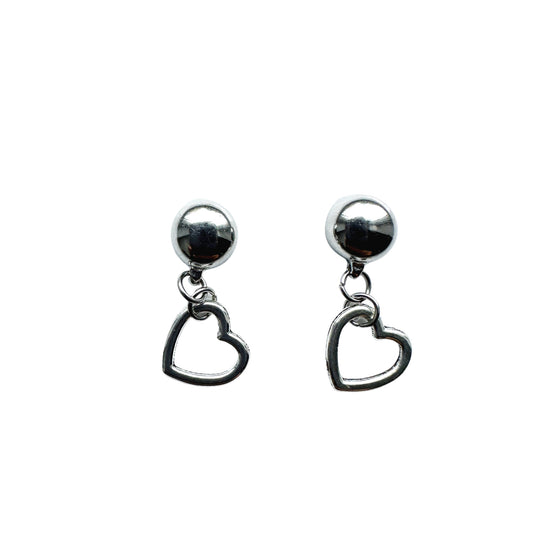 Magnetic Mini silver heart earrings. Detachable earrings for a truly hypoallergenic jewellery on a white background