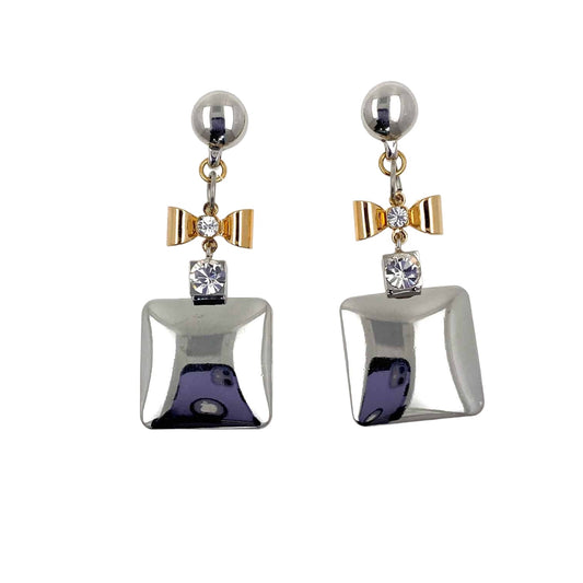 Magnetic Minaudiere earrings. Detachable earrings for a truly hypoallergenic jewellery on a white background