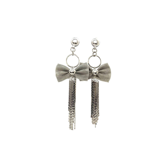 Silver chains and beautiful bow earring. Detachable earrings for a truly hypoallergenic jewellery on a white background