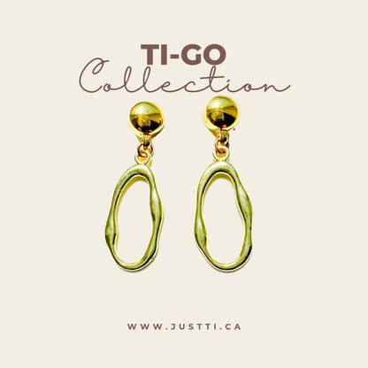 Gold oblong loop earrings. Detachable earrings for a truly hypoallergenic jewellery on a white collection background