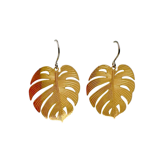 Large Monstera Leaf Earrings with a titanium hook on a white background