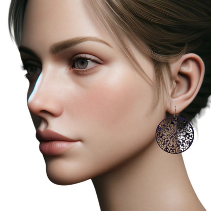 Large black geometric disc earrings with a titanium hook on a white young woman.