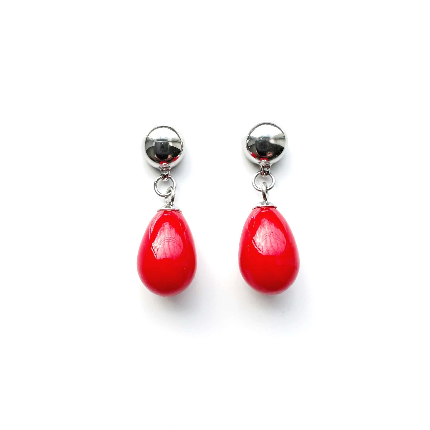 Magnetic Red pearl earrings. Detachable earrings for a truly hypoallergenic jewellery on a white background