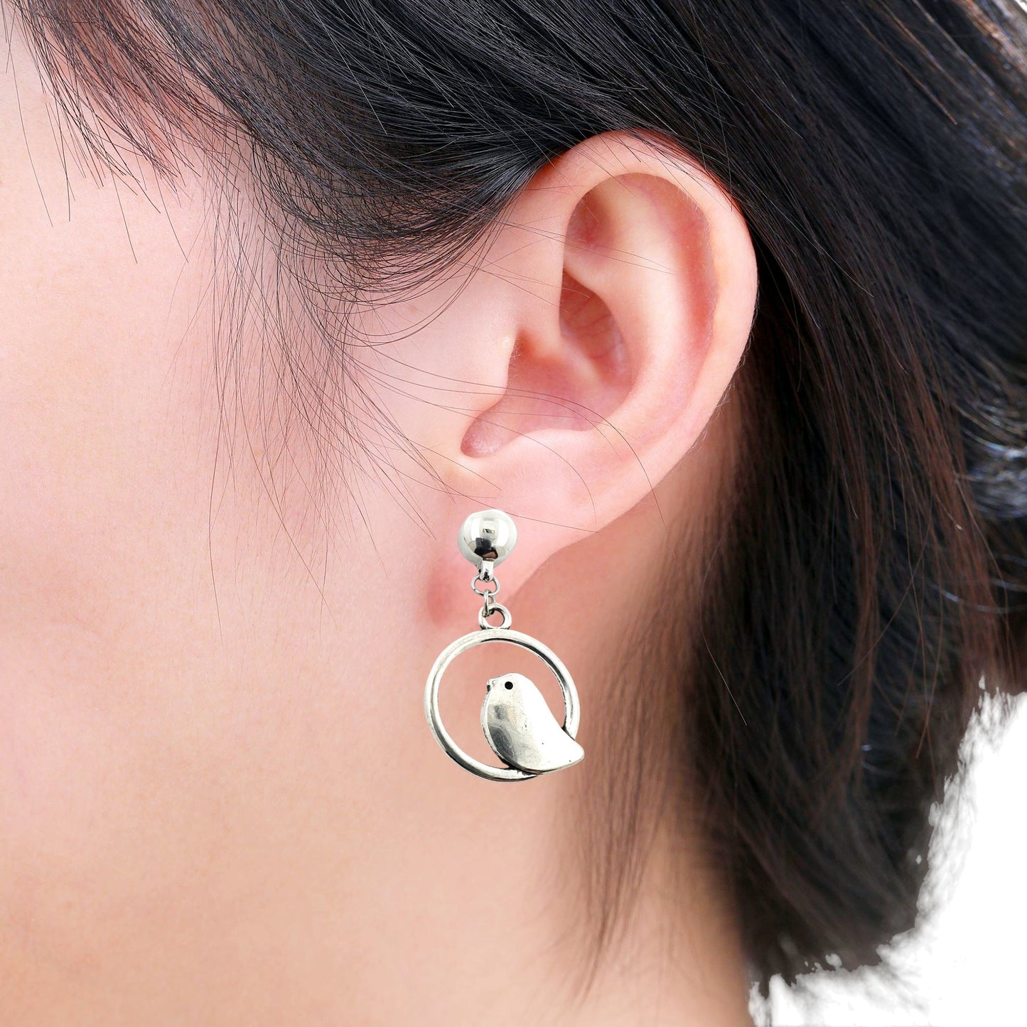 Interchangeable earrings Nightingale on a woman