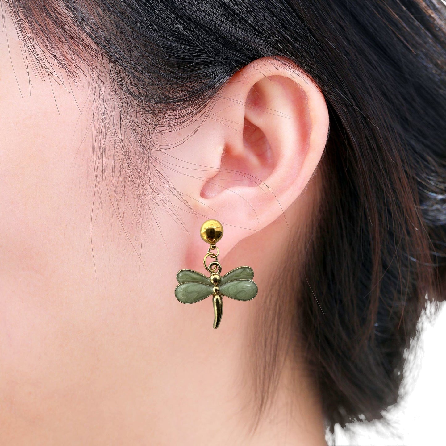 Pearly Dragonfly earrings. Detachable earrings for a truly hypoallergenic jewellery on a white young woman