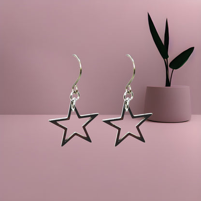 Boucles d'oreilles en titane minimalistes en argent et or avec étoiles
