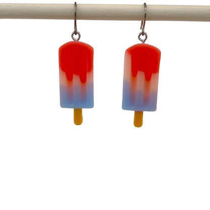 Popsicle earrings with a titanium hook on a white background. blue red