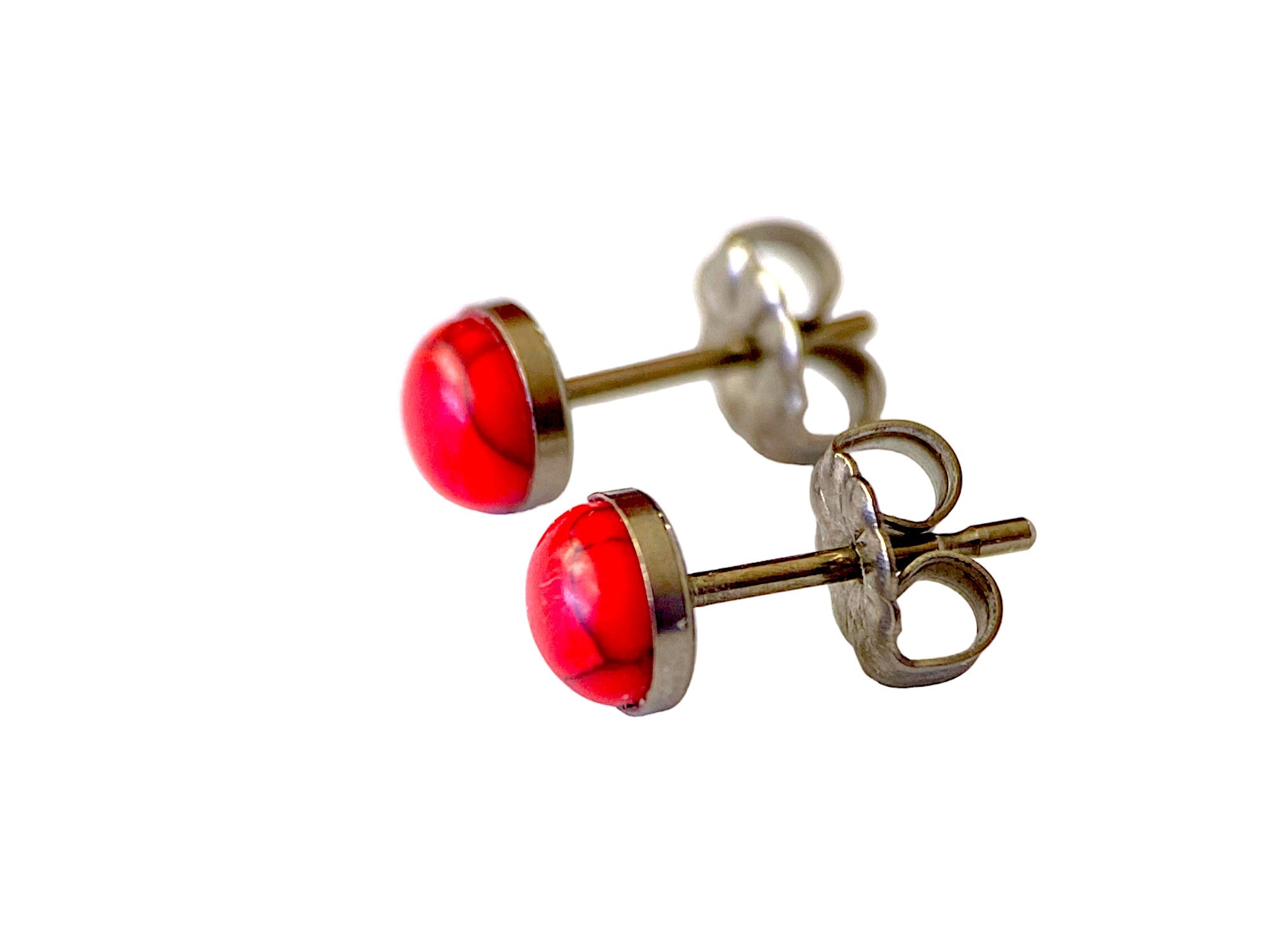 Marbled Studs -solid titanium studs and backs- Feature a small and minimal design on a white background. red