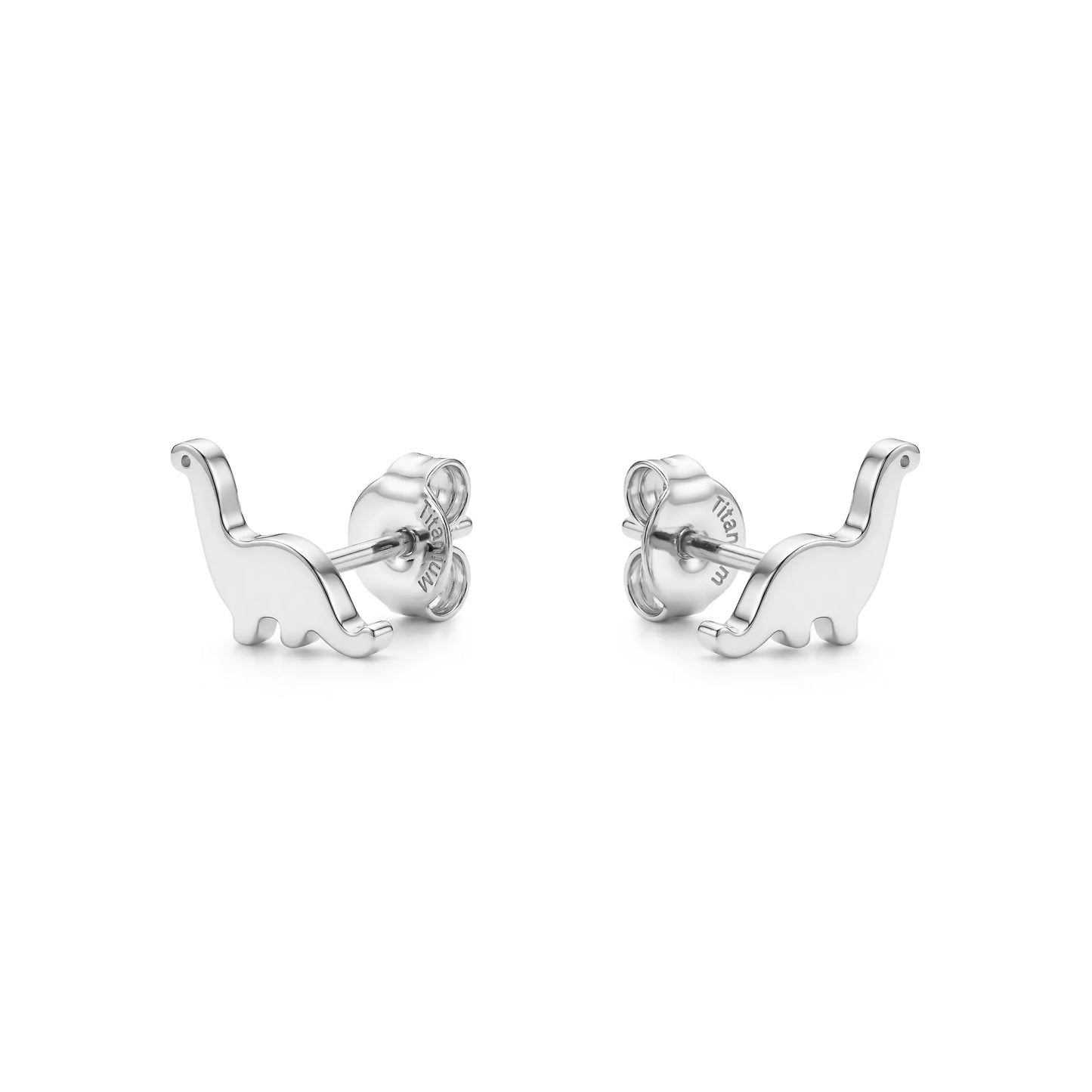 Dinosaur studs solid titanium small and on a white background. 