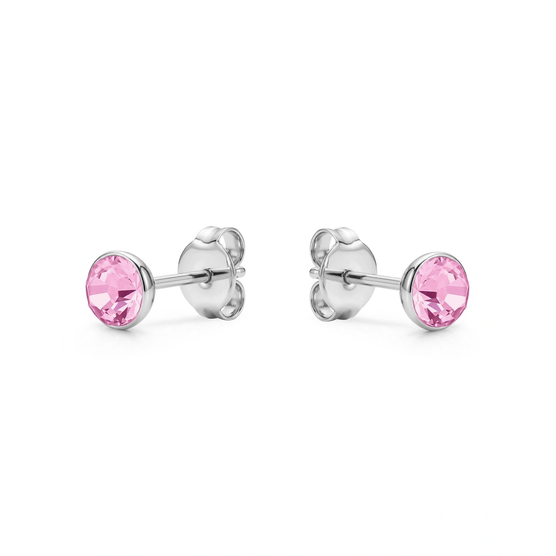 Pink Gem Studs solid titanium studs and backs Feature a small and minimal design on a white background