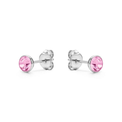 Pink Gem Studs solid titanium studs and backs Feature a small and minimal design on a white background