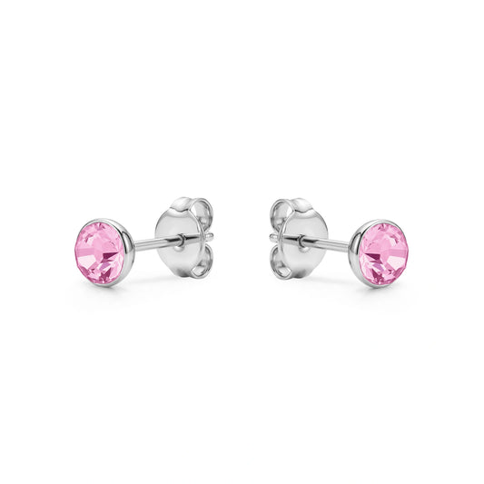 Pink Gem Studs solid titanium studs and backs Feature a small and minimal design on a white background