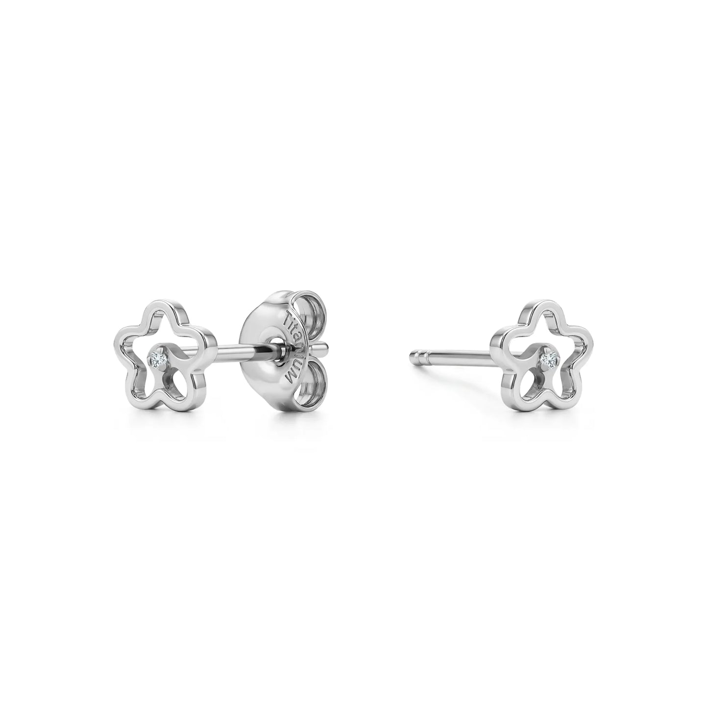 Flower stud titanium earrings studs with backs adjustable fit minimal studs shown on a white background