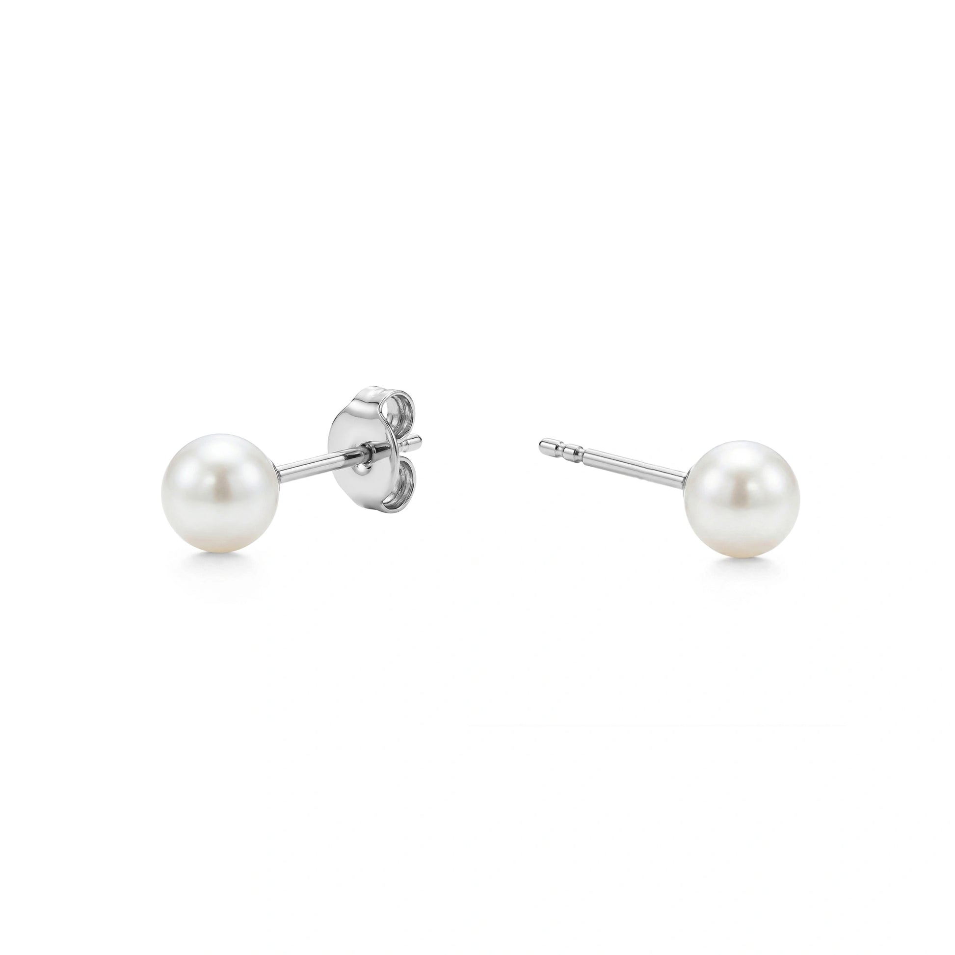 Pearl titanium stud 2 step earrings on a white background