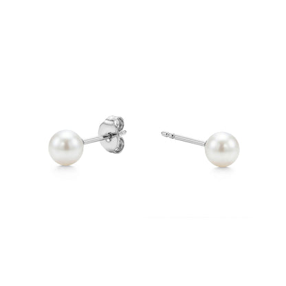 Pearl titanium stud 2 step earrings on a white background