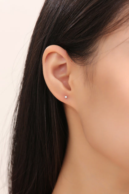 Diamond Gem Titanium Studs 2 mm standard fit very small gems on a white woman.