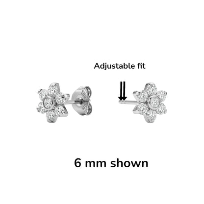 Pair of 6 mm titanium earrings with adjustable fit feature on a white background