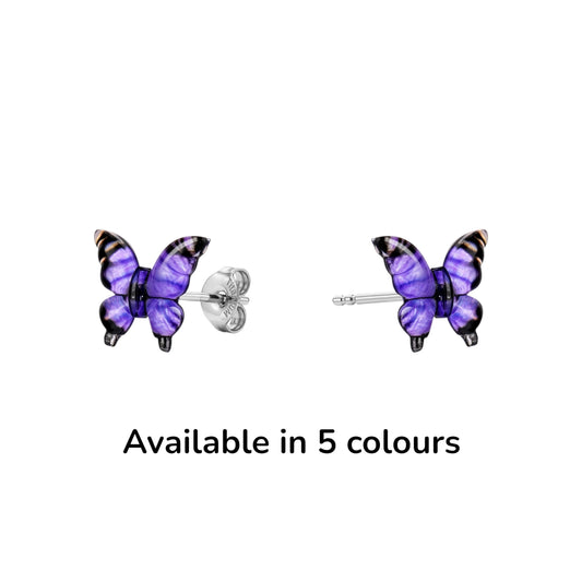 Small butterfly-shaped titanium stud earrings in shades of purple availaable in 5 colours.