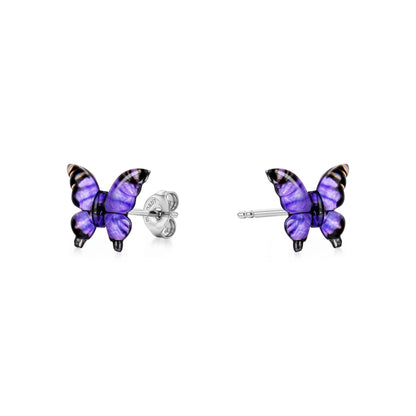 Small butterfly-shaped titanium stud earrings in shades of purple