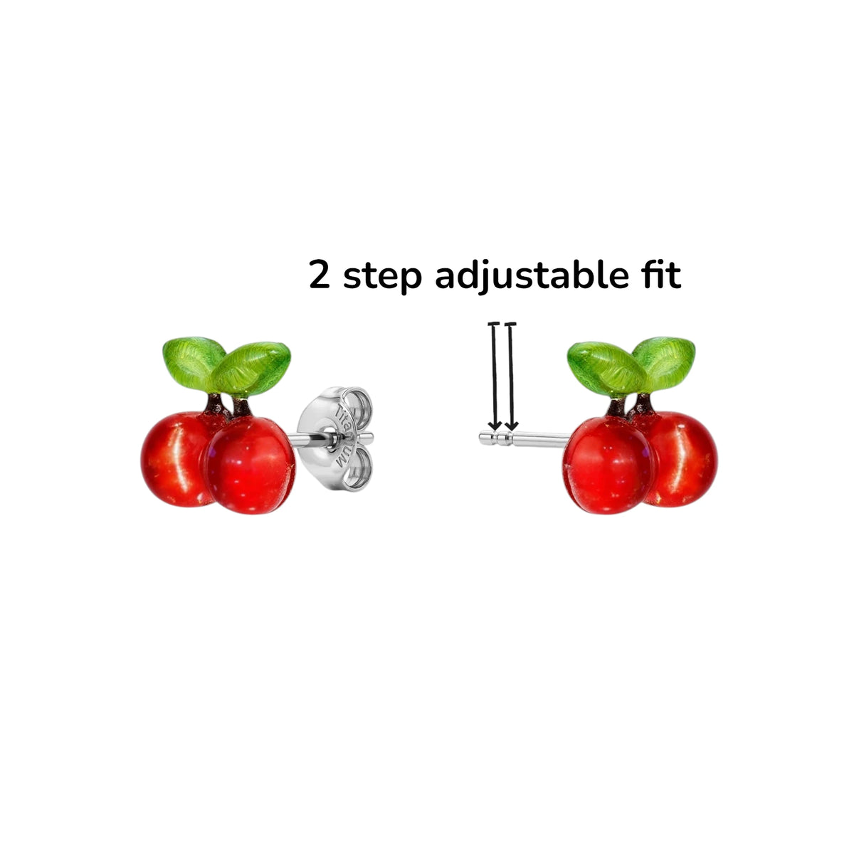 Two red cherry titanium stud earrings with green leaves are shown on a white background, with text reading '2 step adjustable fit' and a simple diagram of the adjustable post on the right.