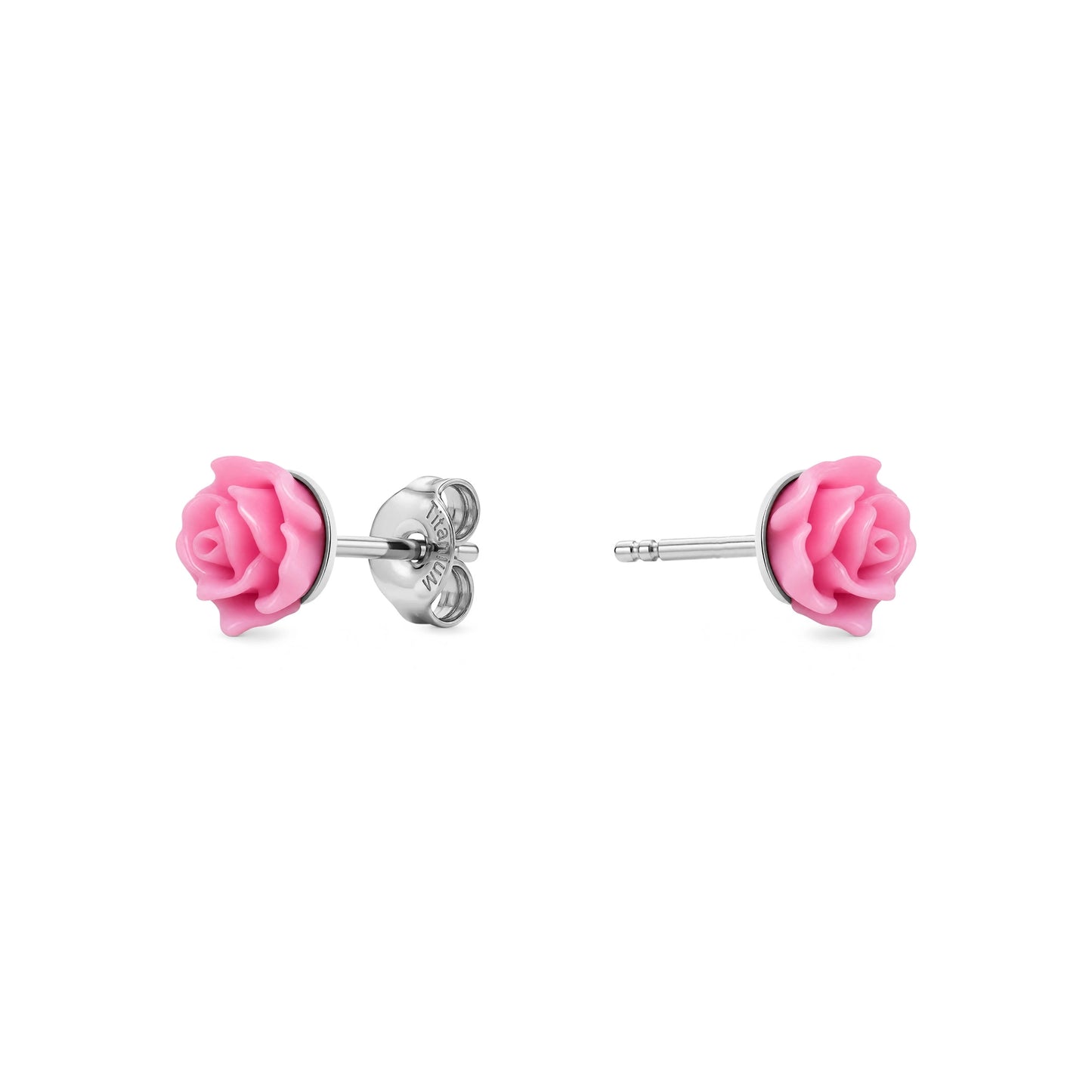A pair of titanium stud earrings featuring pink rose-shaped enamel tops, shown on a clean white background with one earring facing forward and the other showing the backing.