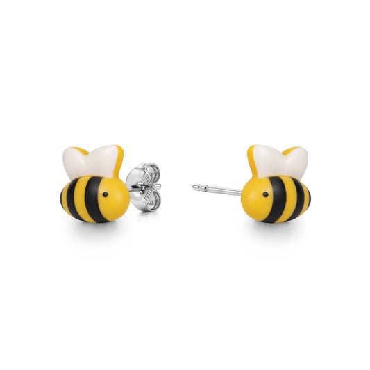 A pair of titanium stud earrings shaped like bumblebees, featuring yellow and black striped bodies, white wings, and silver-tone posts and backings, shown on a clean white background.