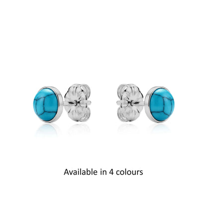 Pair of titanium earrings with light blue stones available in 4 colours on a white background