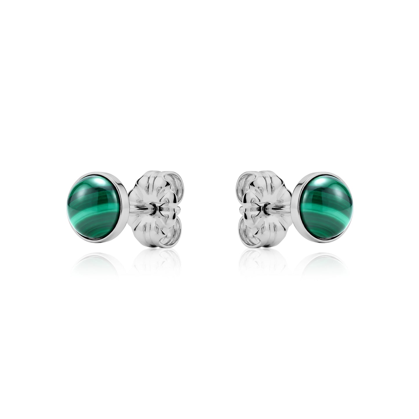 Pair of titanium earrings with green gemstones on a white background