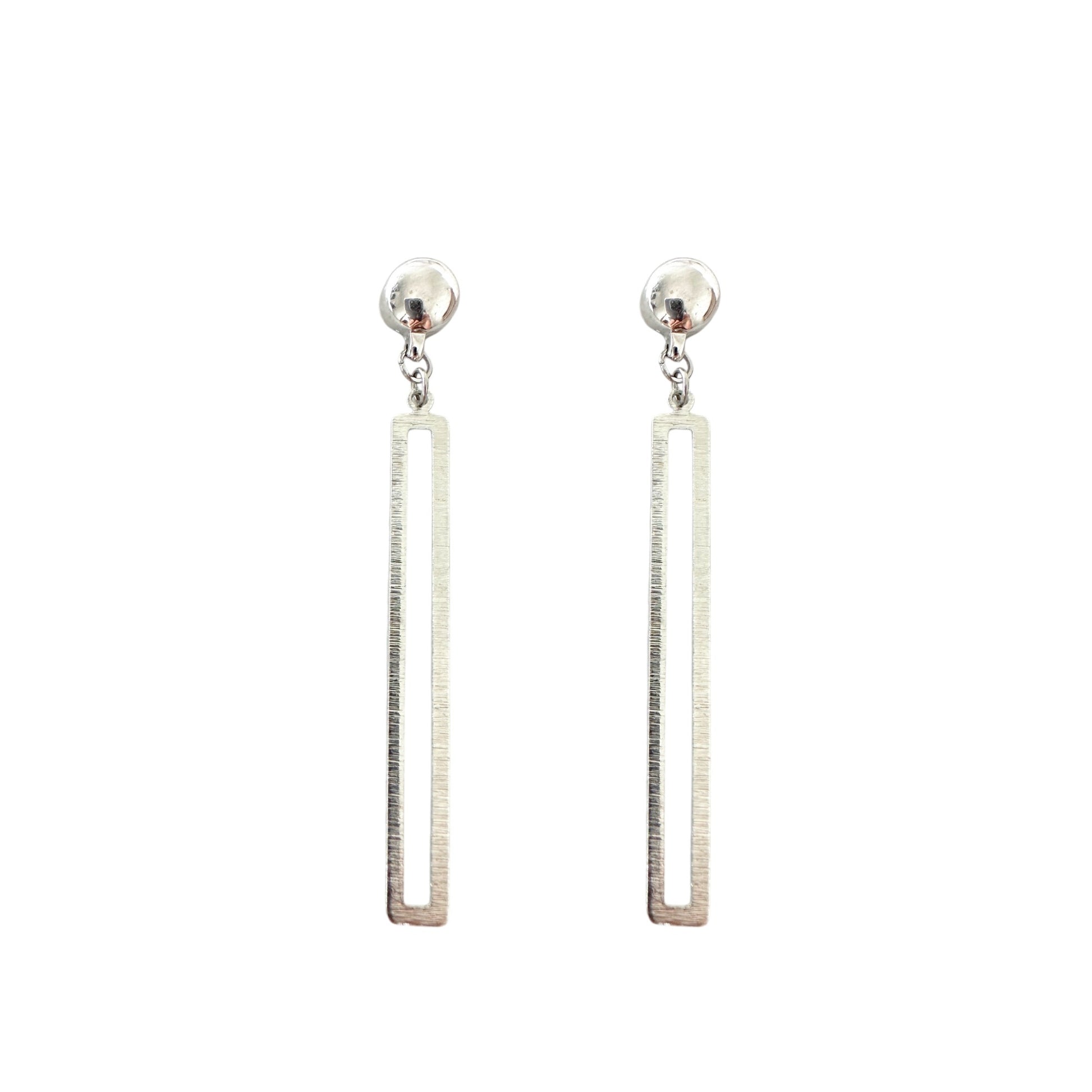 Silver rectangular loop earring. Detachable earrings for a truly hypoallergenic jewellery on a white background